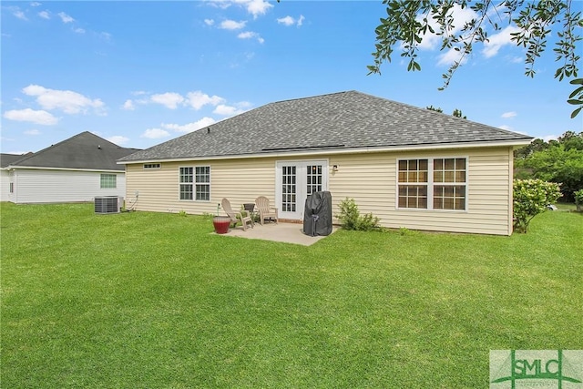 169 Nandina Way, Pooler, GA 31322 - rear view of house with a lawn, a patio area, roof with shingles, and cooling unit
