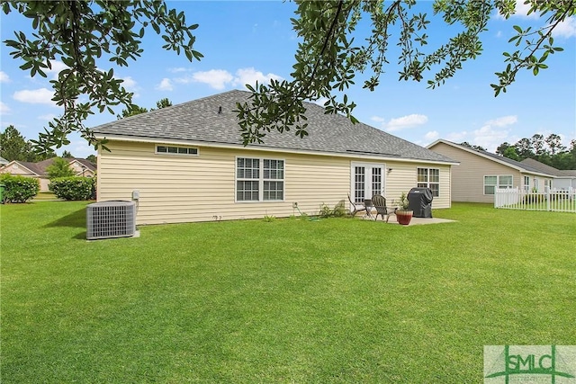 169 Nandina Way, Pooler, GA 31322 - back of property featuring roof with shingles, fence, central AC unit, and a yard
