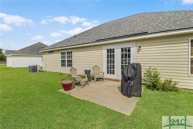 169 Nandina Way, Pooler, GA 31322 - rear view of house featuring roof with shingles, a yard, a patio area, and cooling unit