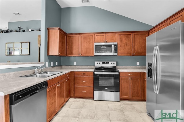 169 Nandina Way, Pooler, GA 31322 - kitchen featuring light countertops, stainless steel appliances, vaulted ceiling, and a sink