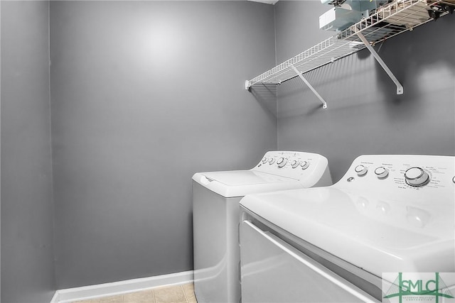 169 Nandina Way, Pooler, GA 31322 - laundry area featuring independent washer and dryer, laundry area, baseboards, and tile patterned floors