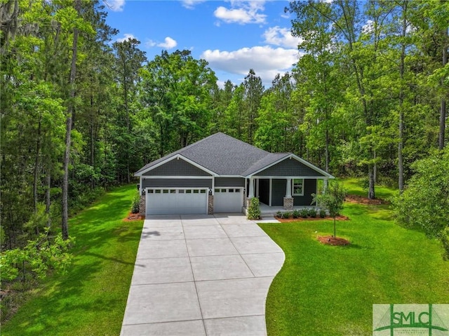 20 Serenity Pt, Savannah, GA 31419 - view of front of property featuring a porch, a forest view, driveway, a front lawn, and an attached garage
