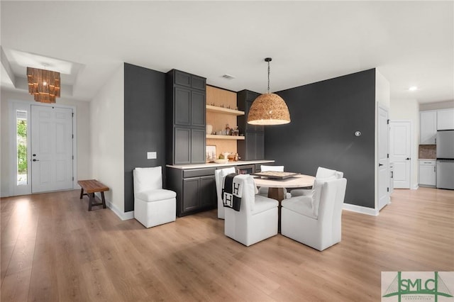 20 Serenity Pt, Savannah, GA 31419 - dining room featuring baseboards, recessed lighting, light wood-style flooring, and an inviting chandelier