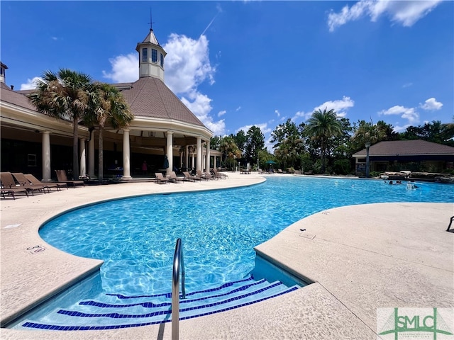20 Serenity Pt, Savannah, GA 31419 - community pool with a patio area