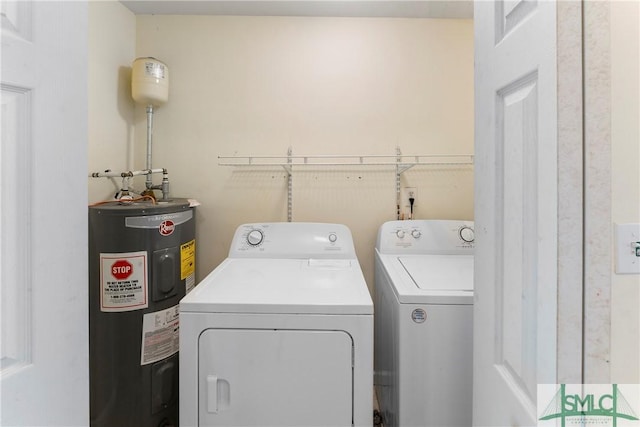 1145 Graydon St, Savannah, GA 31404 - clothes washing area featuring independent washer and dryer, laundry area, and water heater
