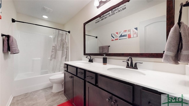 bathroom with double vanity, toilet, shower / bathtub combination with curtain, and a sink