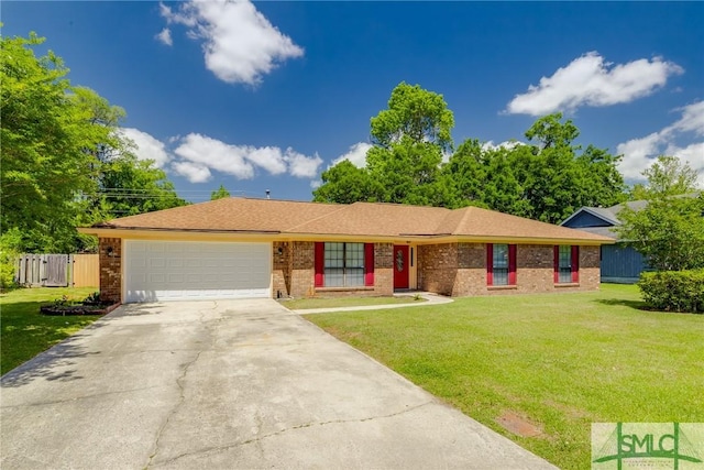 ranch-style home featuring fence, brick siding, a garage, a front yard, and concrete driveway