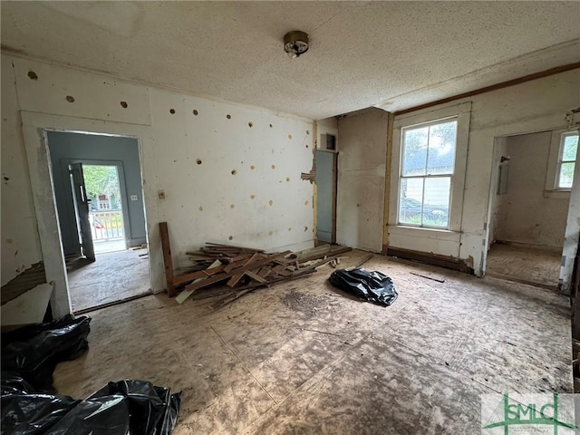 misc room with a textured ceiling
