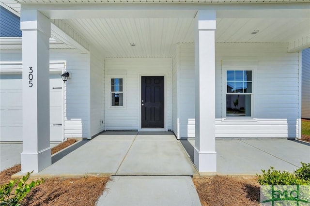 property entrance with a porch