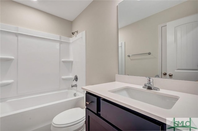 full bathroom featuring bathing tub / shower combination, vanity, and toilet