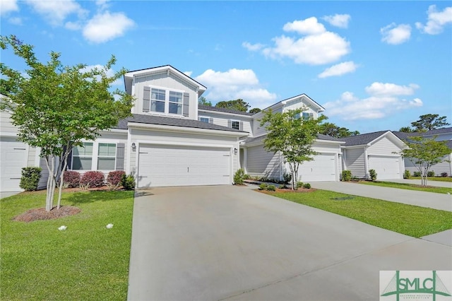 127 Lower Creek Dr, Richmond Hill, GA 31324 - view of front of property with an attached garage, concrete driveway, and a front yard