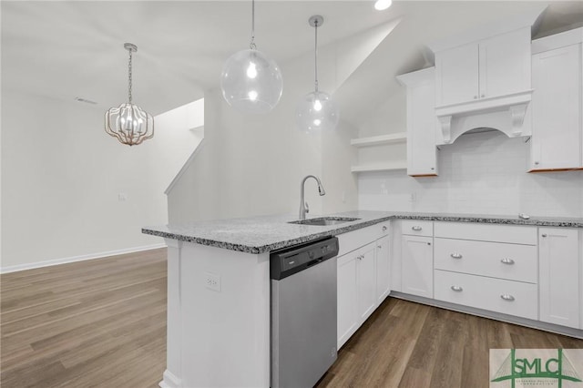 127 Lower Creek Dr, Richmond Hill, GA 31324 - kitchen featuring open shelves, wood finished floors, dishwasher, a sink, and white cabinets
