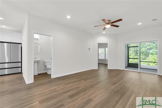 127 Lower Creek Dr, Richmond Hill, GA 31324 - unfurnished living room with recessed lighting, a ceiling fan, baseboards, and wood finished floors