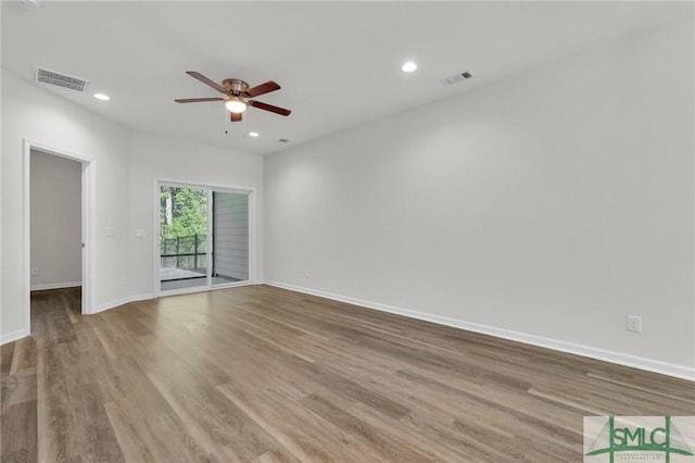 127 Lower Creek Dr, Richmond Hill, GA 31324 - unfurnished room featuring baseboards, ceiling fan, visible vents, and wood finished floors