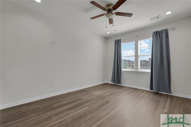 127 Lower Creek Dr, Richmond Hill, GA 31324 - empty room featuring baseboards, ceiling fan, wood finished floors, and visible vents