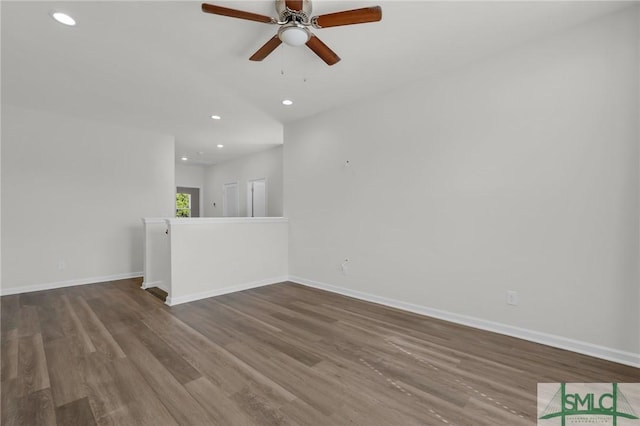 127 Lower Creek Dr, Richmond Hill, GA 31324 - unfurnished living room with baseboards, recessed lighting, ceiling fan, and wood finished floors