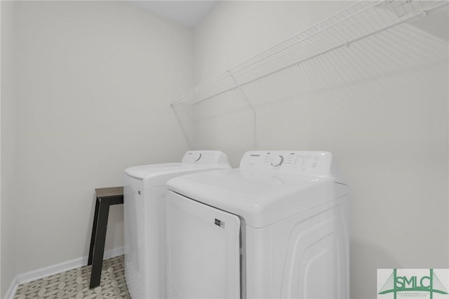 127 Lower Creek Dr, Richmond Hill, GA 31324 - laundry area featuring baseboards, laundry area, and washer and dryer
