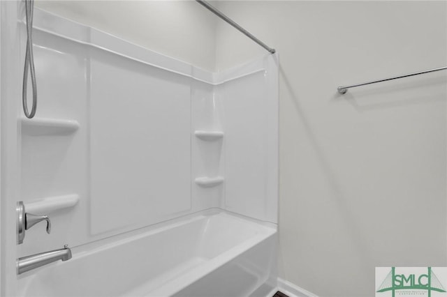 127 Lower Creek Dr, Richmond Hill, GA 31324 - full bathroom with baseboards and shower / washtub combination