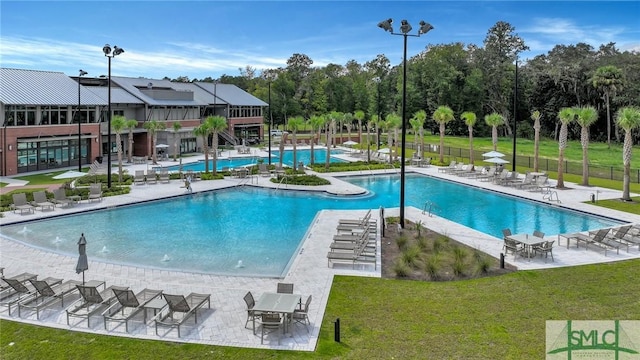 127 Lower Creek Dr, Richmond Hill, GA 31324 - pool featuring a lawn and a patio