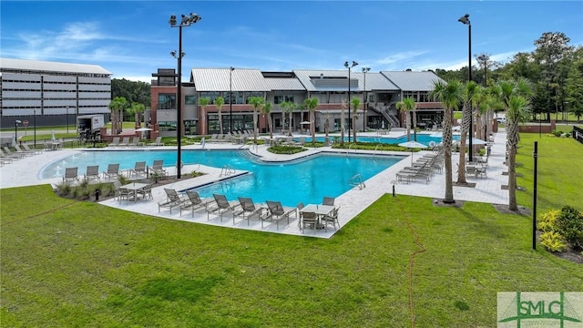 127 Lower Creek Dr, Richmond Hill, GA 31324 - pool featuring a patio and a yard