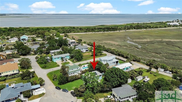 106 Pelican Ct, Tybee Island, GA 31328 - drone / aerial view featuring a residential view and a water view