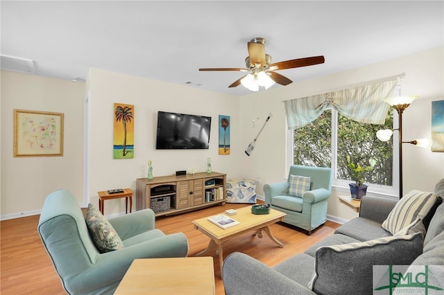 106 Pelican Ct, Tybee Island, GA 31328 - living room with baseboards, ceiling fan, wood finished floors, and visible vents