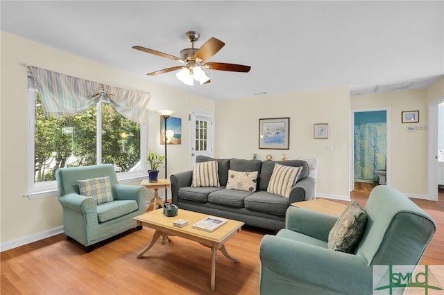 106 Pelican Ct, Tybee Island, GA 31328 - living room featuring baseboards, a ceiling fan, wood finished floors, and visible vents