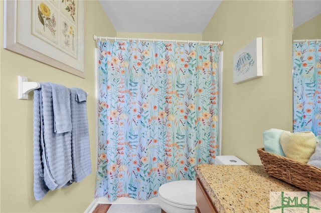 106 Pelican Ct, Tybee Island, GA 31328 - full bath with toilet, curtained shower, and vanity