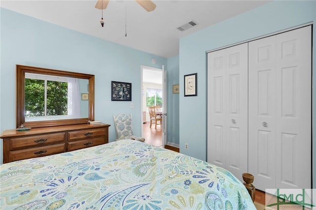106 Pelican Ct, Tybee Island, GA 31328 - bedroom featuring visible vents, ceiling fan, wood finished floors, and a closet