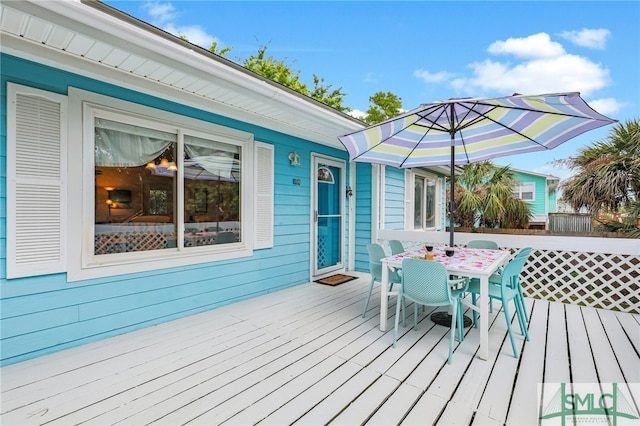 106 Pelican Ct, Tybee Island, GA 31328 - deck with outdoor dining space