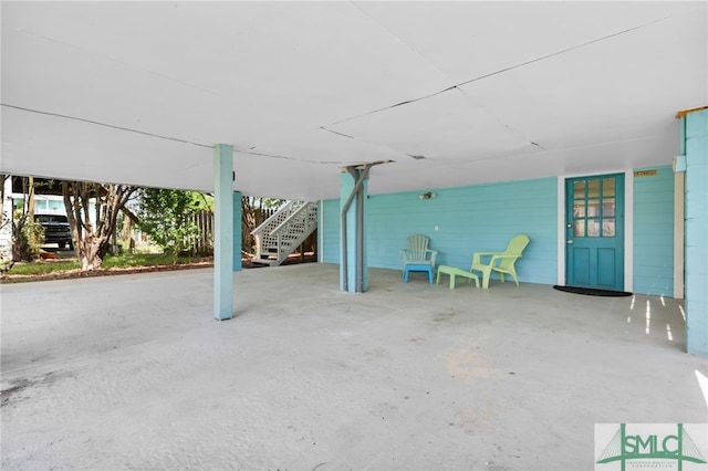106 Pelican Ct, Tybee Island, GA 31328 - view of patio featuring stairway