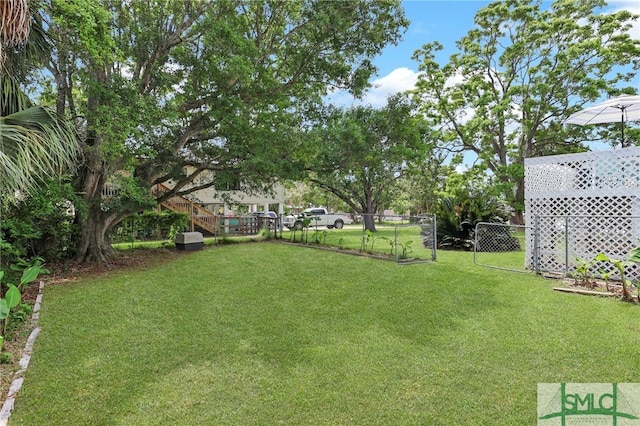 106 Pelican Ct, Tybee Island, GA 31328 - view of yard featuring fence