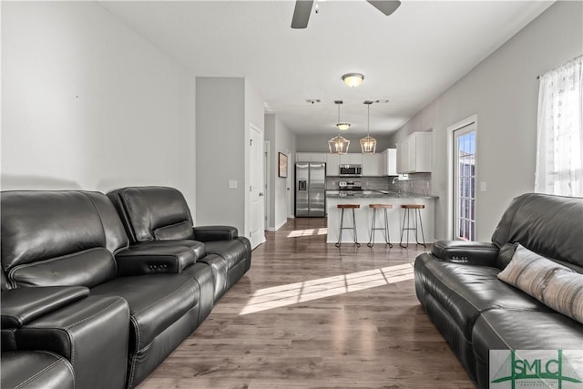 63 Springer Cir, Ludowici, GA 31316 - living room with a ceiling fan and dark wood-type flooring