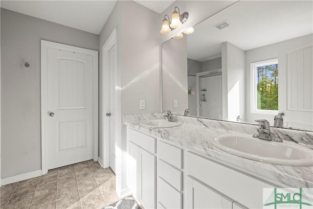 63 Springer Cir, Ludowici, GA 31316 - full bath with a sink, a shower stall, double vanity, and visible vents