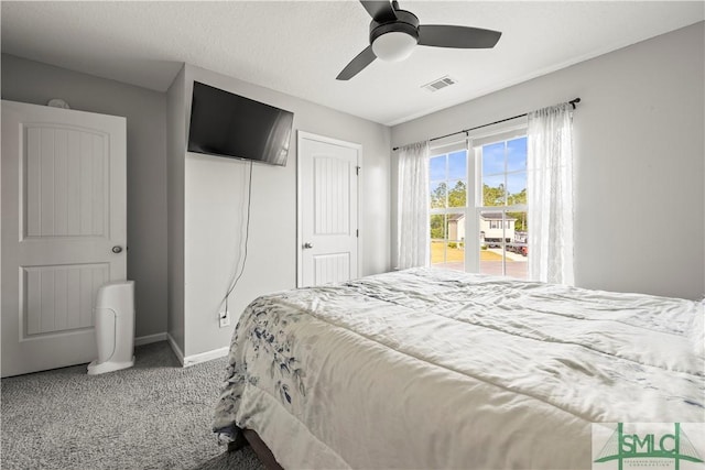 63 Springer Cir, Ludowici, GA 31316 - carpeted bedroom featuring a ceiling fan, baseboards, visible vents, and a closet