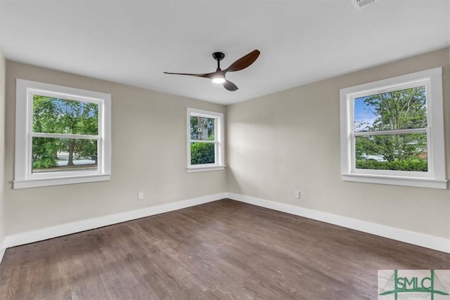 1107 E Derenne Ave, Savannah, GA 31406 - spare room featuring baseboards, ceiling fan, and wood finished floors