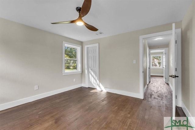 1107 E Derenne Ave, Savannah, GA 31406 - spare room featuring baseboards, a ceiling fan, wood finished floors, and visible vents