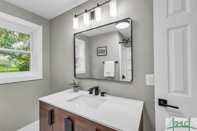 1107 E Derenne Ave, Savannah, GA 31406 - bathroom with baseboards and vanity