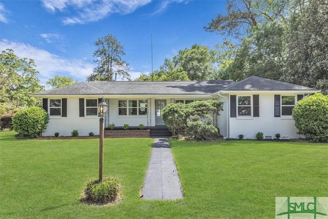 1107 E Derenne Ave, Savannah, GA 31406 - single story home featuring a front yard and stucco siding