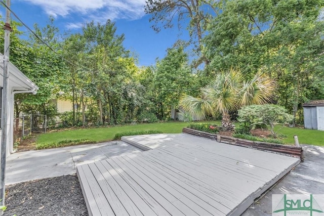 1107 E Derenne Ave, Savannah, GA 31406 - wooden deck featuring a lawn