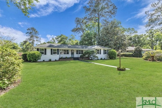 1107 E Derenne Ave, Savannah, GA 31406 - ranch-style home featuring a front yard and stucco siding