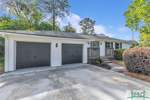 1107 E Derenne Ave, Savannah, GA 31406 - ranch-style house with an attached garage and concrete driveway