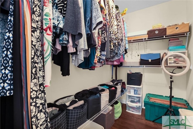 spacious closet with wood finished floors
