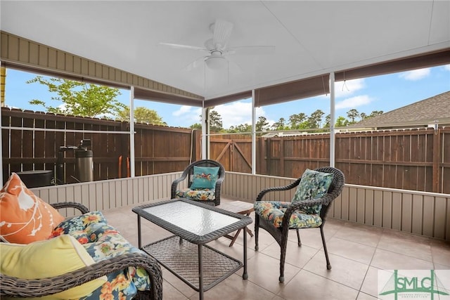 sunroom / solarium with ceiling fan