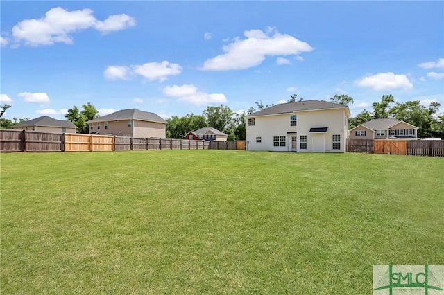 view of yard featuring a fenced backyard