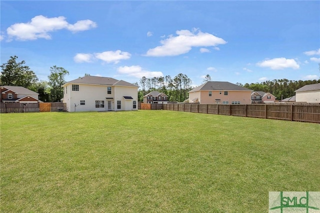 view of yard featuring a fenced backyard