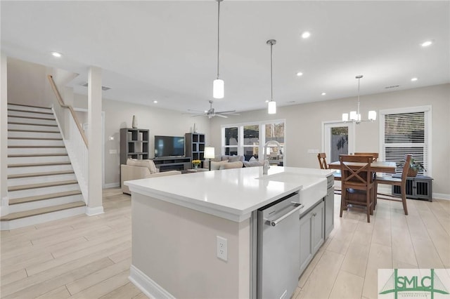 130 Canter Ct, Savannah, GA 31406 - kitchen with dishwasher, light wood-type flooring, light countertops, recessed lighting, and a center island with sink