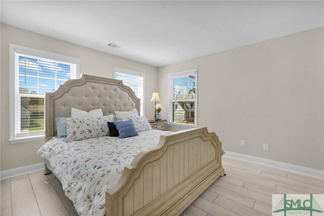 130 Canter Ct, Savannah, GA 31406 - bedroom featuring baseboards and light wood-type flooring