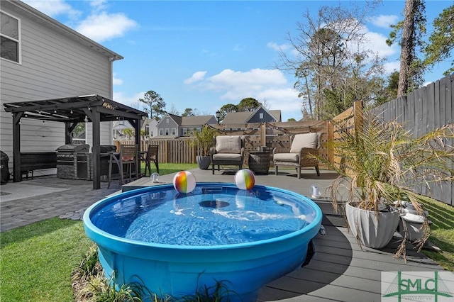 130 Canter Ct, Savannah, GA 31406 - deck featuring a jacuzzi, a fenced backyard, and a pergola