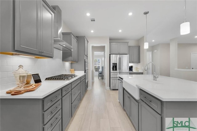 130 Canter Ct, Savannah, GA 31406 - kitchen featuring gray cabinetry, appliances with stainless steel finishes, a sink, tasteful backsplash, and recessed lighting
